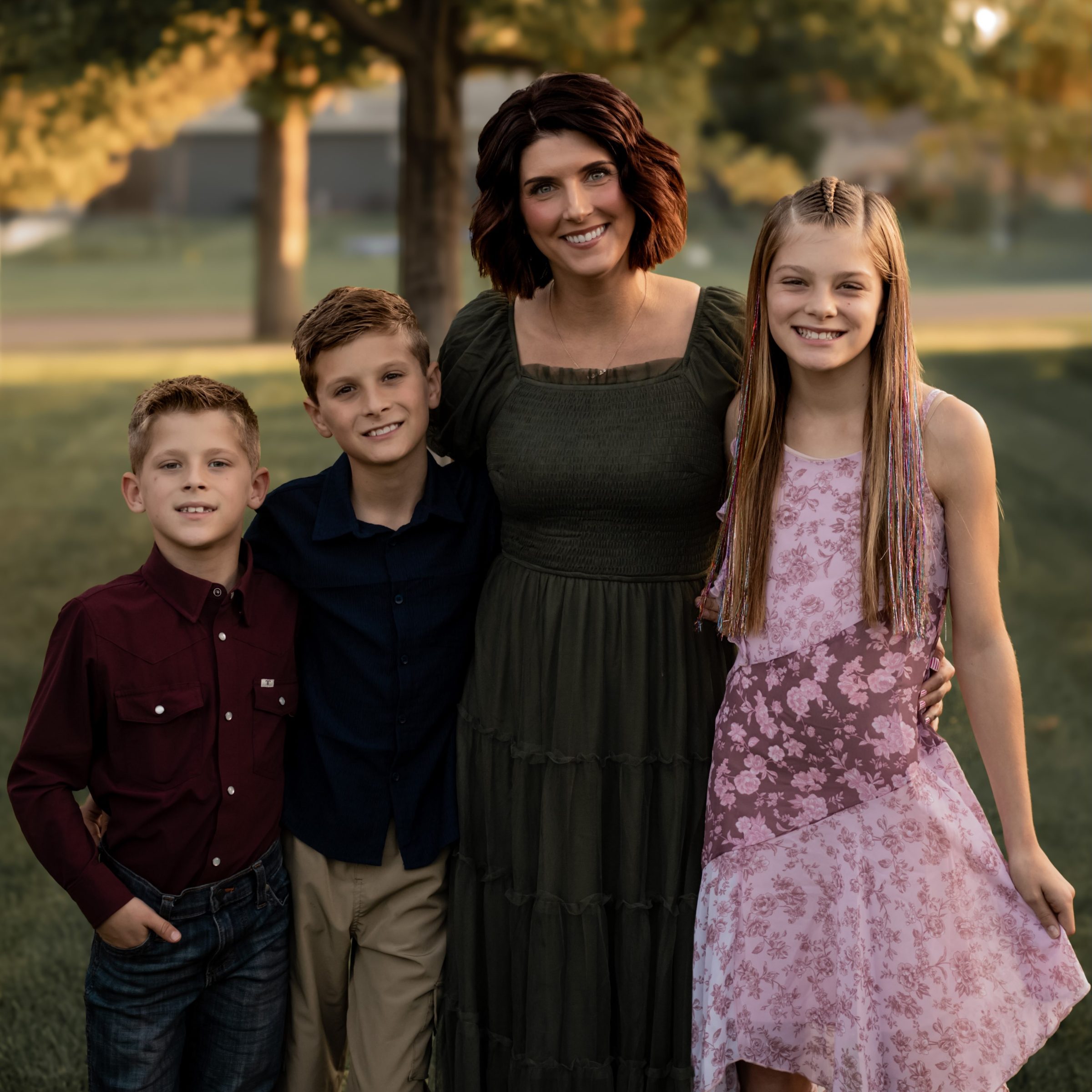 Mother with her three children during a fall family session